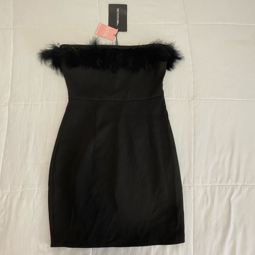 Black feather trimmed black body on mini dress size us 2